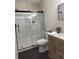 Modern bathroom features a glass-enclosed shower, and updated sink vanity at 4614 Eagles Nest Rd, Fruitland Park, FL 34731