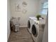 The laundry room offers ample space, and is very functional at 4614 Eagles Nest Rd, Fruitland Park, FL 34731