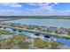 Picturesque waterfront community featuring luxury homes with private docks along a scenic lake at 481 Blue Cypress Dr, Groveland, FL 34736