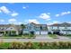 Charming two-story home with a well-manicured lawn, a two car garage and beautiful landscaping at 481 Blue Cypress Dr, Groveland, FL 34736