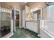 Bathroom featuring tile floors, a walk-in shower, and a soaking tub at 4826 Summerbridge Cir, Leesburg, FL 34748