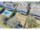 Expansive home lot shown from above with backyard, landscaping, and neighboring houses at 4951 Cypress Hammock Dr, St Cloud, FL 34771