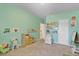 bedroom with light blue walls, carpet flooring and ample lighting at 4951 Cypress Hammock Dr, St Cloud, FL 34771