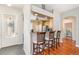 View of the kitchen with breakfast bar and seating at 5370 Indian Ocean Loop, Tavares, FL 32778