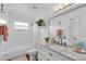 Clean and well-lit bathroom with a marble countertop, providing a comfortable and functional space at 54 Pecan Pass, Ocala, FL 34472