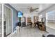 Bonus room with gray tile flooring, offering versatile space for various activities and relaxation at 54 Pecan Pass, Ocala, FL 34472