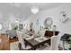 Elegant dining room with hardwood floors and an open layout at 54 Pecan Pass, Ocala, FL 34472