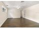 Spacious bedroom featuring wood floors, white trim, neutral walls and a ceiling fan at 580 Page Ln, Mount Dora, FL 32757