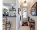 Inviting foyer with decorative accents and a view into the kitchen, creating a welcoming entrance at 5952 Brittania Blvd, Tavares, FL 32778