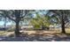 A charming single-story home with large trees in the front yard, with ample space to enjoy nature at 6720 Se 107Th St, Belleview, FL 34420