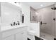 Updated bathroom featuring modern vanity, glass enclosed shower with bronze hardware, and tiled walls at 674 Waterman Way, The Villages, FL 32163