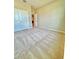 Bedroom with carpet flooring and double door closet at 6853 Se 3Rd Loop, Ocala, FL 34472