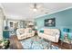 Open-plan living room with dining area, view of the kitchen, and lots of natural light at 9894 Se 138Th Loop, Summerfield, FL 34491