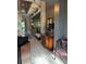 Entryway features gorgeous decor, tile floors, high ceilings, and custom paint at 10267 Julia Isles Ave, Oxford, FL 34484