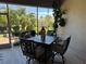 Screened-in patio with outdoor seating, garden views, and an inviting space for relaxation at 10267 Julia Isles Ave, Oxford, FL 34484