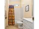 Bathroom featuring a tiled floor, shower over tub and sink at 12239 Se 92Nd Court Rd, Summerfield, FL 34491