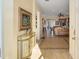Inviting foyer displaying tile flooring, neutral walls, and an open view of the adjacent living area at 12239 Se 92Nd Court Rd, Summerfield, FL 34491