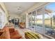 Sunroom featuring comfortable seating and great views at 12239 Se 92Nd Court Rd, Summerfield, FL 34491