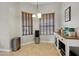 Breakfast nook with corner windows and modern furnishings, bathed in natural light at 13101 Biscayne Dr, Grand Island, FL 32735