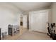 View of a home office featuring a closet, tiled floor and light-grey painted walls at 13101 Biscayne Dr, Grand Island, FL 32735