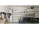 Spacious garage with car, storage, and automatic door at 1723 Happiness Row, Kissimmee, FL 34744