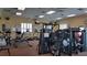 The community gym contains workout machines, free weights, ceiling fans and television monitors at 17490 Se 110Th Ter, Summerfield, FL 34491