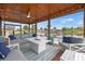Waterfront dock with stylish seating and an inviting atmosphere at 17648 Live Oak Dr, Tavares, FL 32778