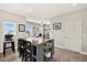 Craft room with a large crafting table, windows providing ample natural light and storage at 17648 Live Oak Dr, Tavares, FL 32778