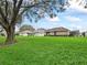 Large backyard is perfect for gatherings, or for enjoying the outdoors at 17728 Se 115Th Ct, Summerfield, FL 34491