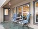 Cozy outdoor patio with seating, perfect for relaxing and enjoying the fresh air at 17728 Se 115Th Ct, Summerfield, FL 34491