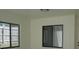 Bonus room featuring natural lighting, neutral walls, and vinyl flooring at 1945 Maple Cir # 45E, Tavares, FL 32778