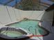 A gorgeous in-ground pool and spa with waterfall features is perfect for outdoor fun at 1945 Maple Cir # 45E, Tavares, FL 32778
