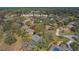 Aerial view of a home at 19666 Sw 88th Loop in a community with many trees at 19666 Sw 88Th Loop, Dunnellon, FL 34432