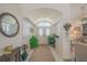 Inviting foyer with high ceilings, neutral colors, and tile flooring at 19666 Sw 88Th Loop, Dunnellon, FL 34432