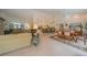 Open concept living area with a kitchen island, dining table, and comfortable seating at 19666 Sw 88Th Loop, Dunnellon, FL 34432