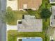 A bird's-eye view of a single-Gathering home with mature landscaping and a spacious backyard at 2136 Kerwood Loop, The Villages, FL 32162