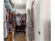 Walk-in closet provides ample storage space, and organizational features, enhancing functionality at 2136 Kerwood Loop, The Villages, FL 32162