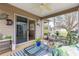 Enjoy this screened lanai and outdoor seating, perfect for relaxation and enjoying the fresh air at 2136 Kerwood Loop, The Villages, FL 32162
