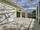 Spacious screened lanai with serene view of the surrounding neighborhood at 2185 Caxton Ave, Clermont, FL 34711