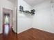 Walk-in closet with wire shelving and hardwood floors at 2185 Caxton Ave, Clermont, FL 34711