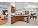Well-equipped kitchen featuring stainless steel appliances and eat in breakfast nook at 2212 Bachman Path, The Villages, FL 32162