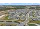 An aerial view of a community featuring attractive homes and landscaping at 2289 Mystic Maze Ln, Minneola, FL 34715