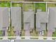 An aerial view captures the community's layout, showcasing the streetscape, manicured lawns, and rooflines at 2289 Mystic Maze Ln, Minneola, FL 34715