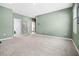 The bonus room is spacious and has 3 door openings in the shot as well as neutral colored walls at 2289 Mystic Maze Ln, Minneola, FL 34715
