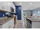 Well-equipped kitchen featuring modern appliances, ample counter space, and an open layout at 2289 Mystic Maze Ln, Minneola, FL 34715