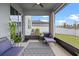 Relaxing screened patio featuring comfortable seating and views of the backyard at 2289 Mystic Maze Ln, Minneola, FL 34715