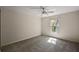 Bedroom featuring carpet, ceiling fan, and bright natural light at 2541 Lake Griffin Rd, Lady Lake, FL 32159