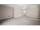 Bedroom with carpet, ceiling fan, and bright natural light at 2541 Lake Griffin Rd, Lady Lake, FL 32159