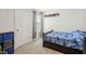Cozy bedroom with playful decor, natural light, and ample closet space at 255 Blueberry Ln, Davenport, FL 33837