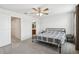 Bedroom with a bed, ceiling fan and en-suite bathroom at 255 Blueberry Ln, Davenport, FL 33837